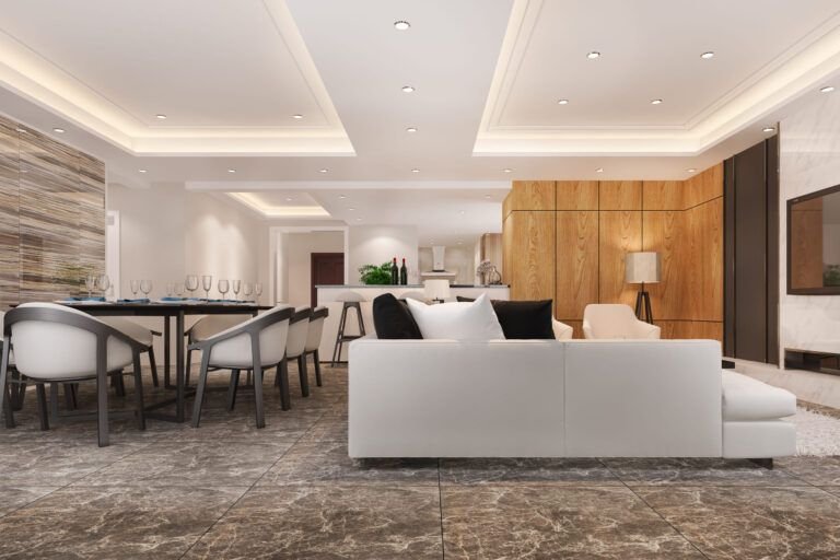 Modern open-concept living space with marble flooring, elegant dining area, and recessed ceiling lighting, showcasing stylish interior wall and ceiling decoration in Quebec for contemporary homes.