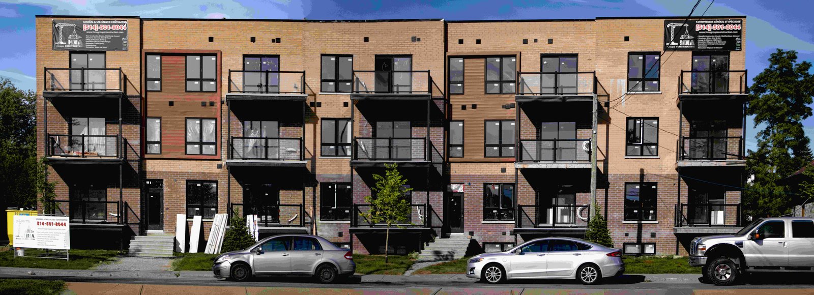 Newly built multi-family residential building on Heiman Street 164 in Kitchener, Ontario, constructed by HMA Groupe Construction, illustrating modern design and quality